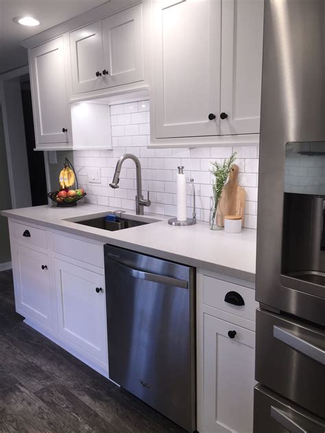 galley kitchen with white cabinets with stainless steel appliances|white galley kitchen designs.